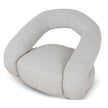 Odette Clay Grey swivel armchair in a modern living room