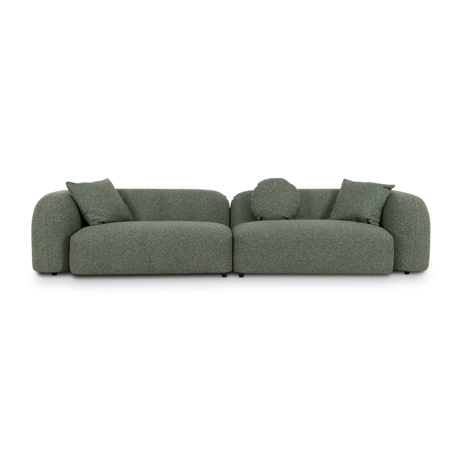 Curved profile of the Celeste Amazon Green sofa