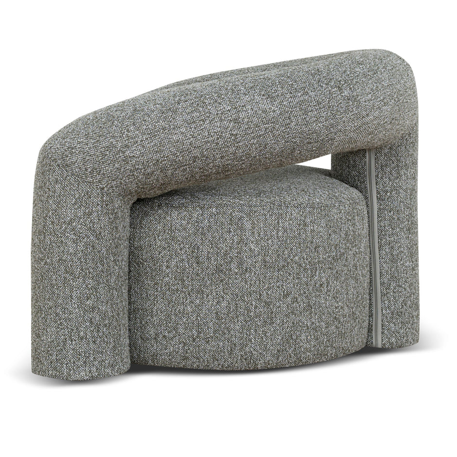 Vela curved green upholstered armchair side view