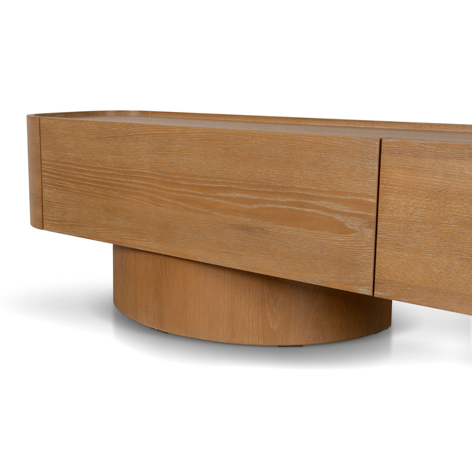 Curved edges and wood grain of the Elara Dusty Oak TV unit
